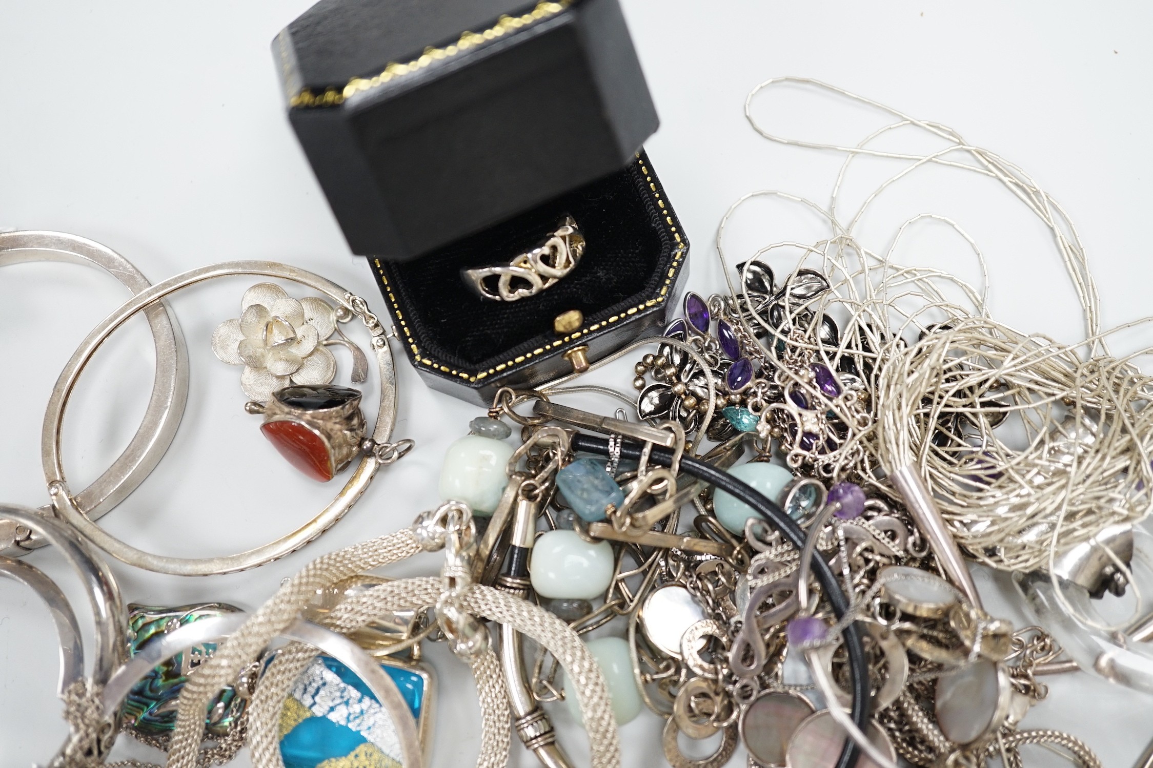 A quantity of assorted jewellery including 925 and white metal bracelets, necklaces, pendants, bangles ring etc.